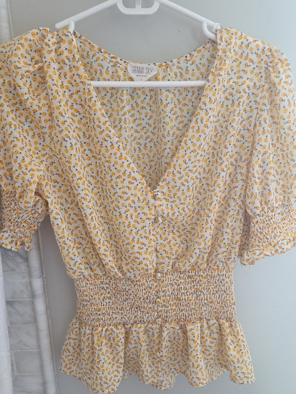 Sienna Sky Yellow Floral V-Neck Smocked Peplum Top